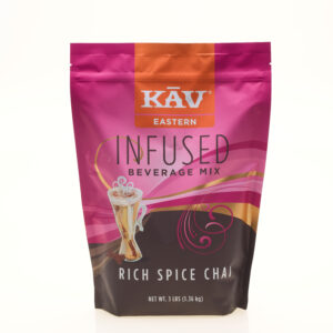 A 3lb standing pouch of Infused Eastern Rich Spice Chai, in pink, orange, and brown, features a chai latte with whipped cream on the front.